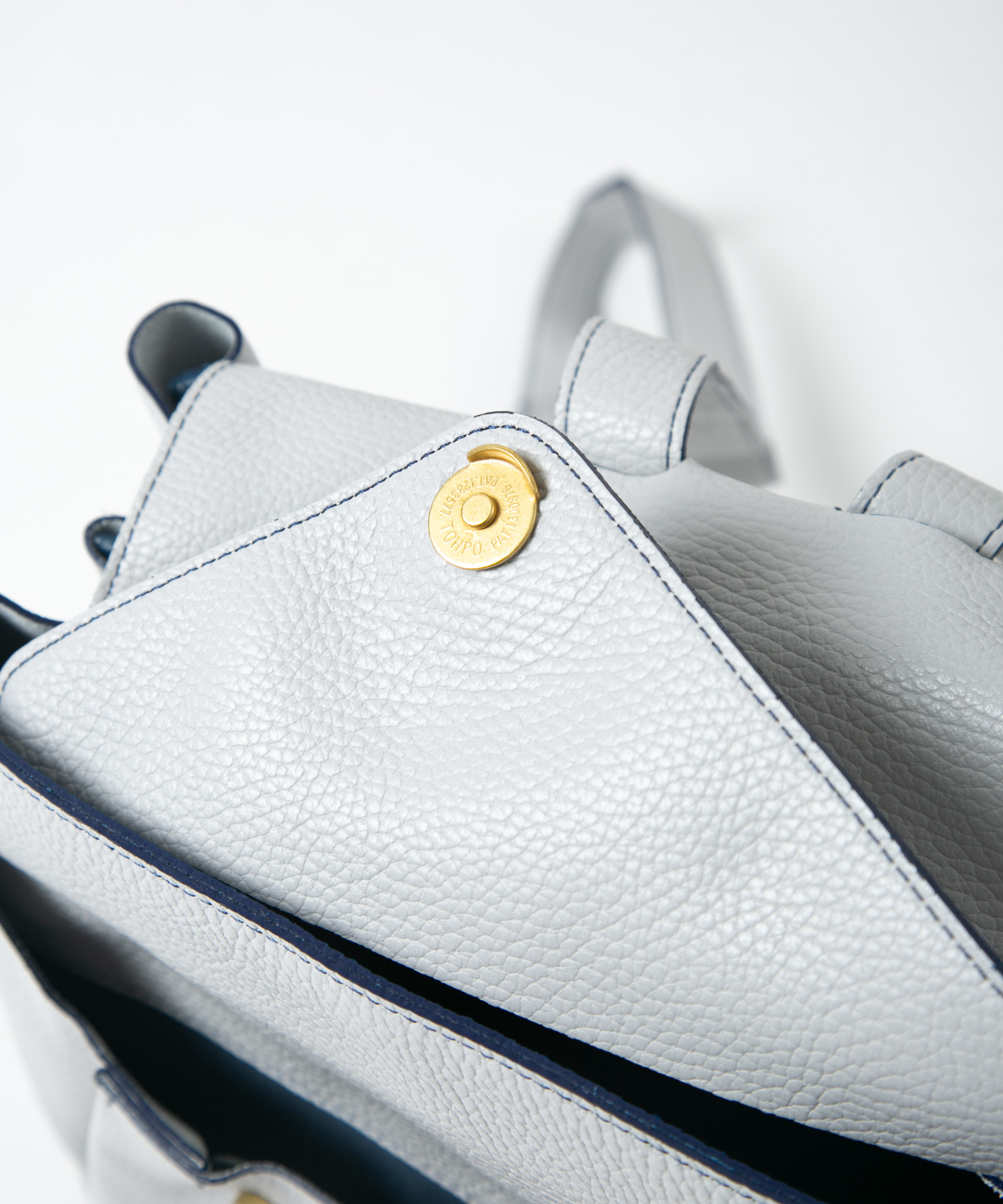 配色レザーリュック