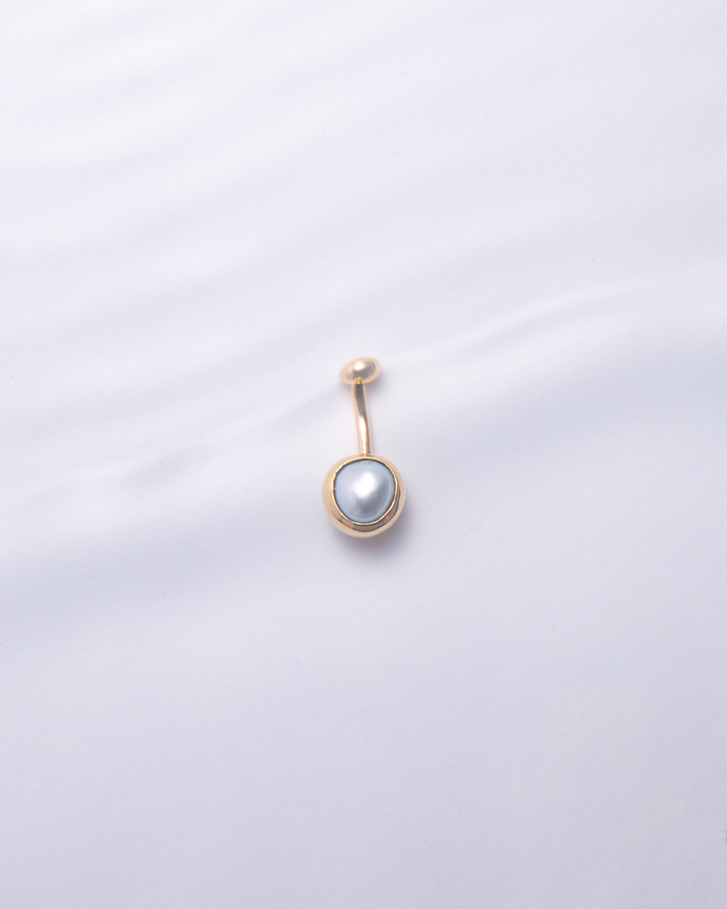 South sea keshi pearl navel piercing
