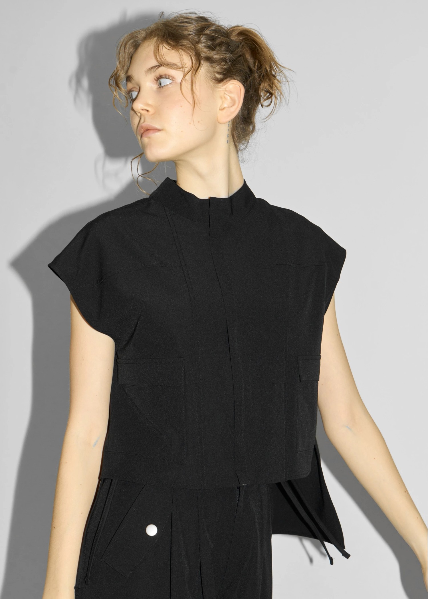 irregular hem flap pocket zip tops