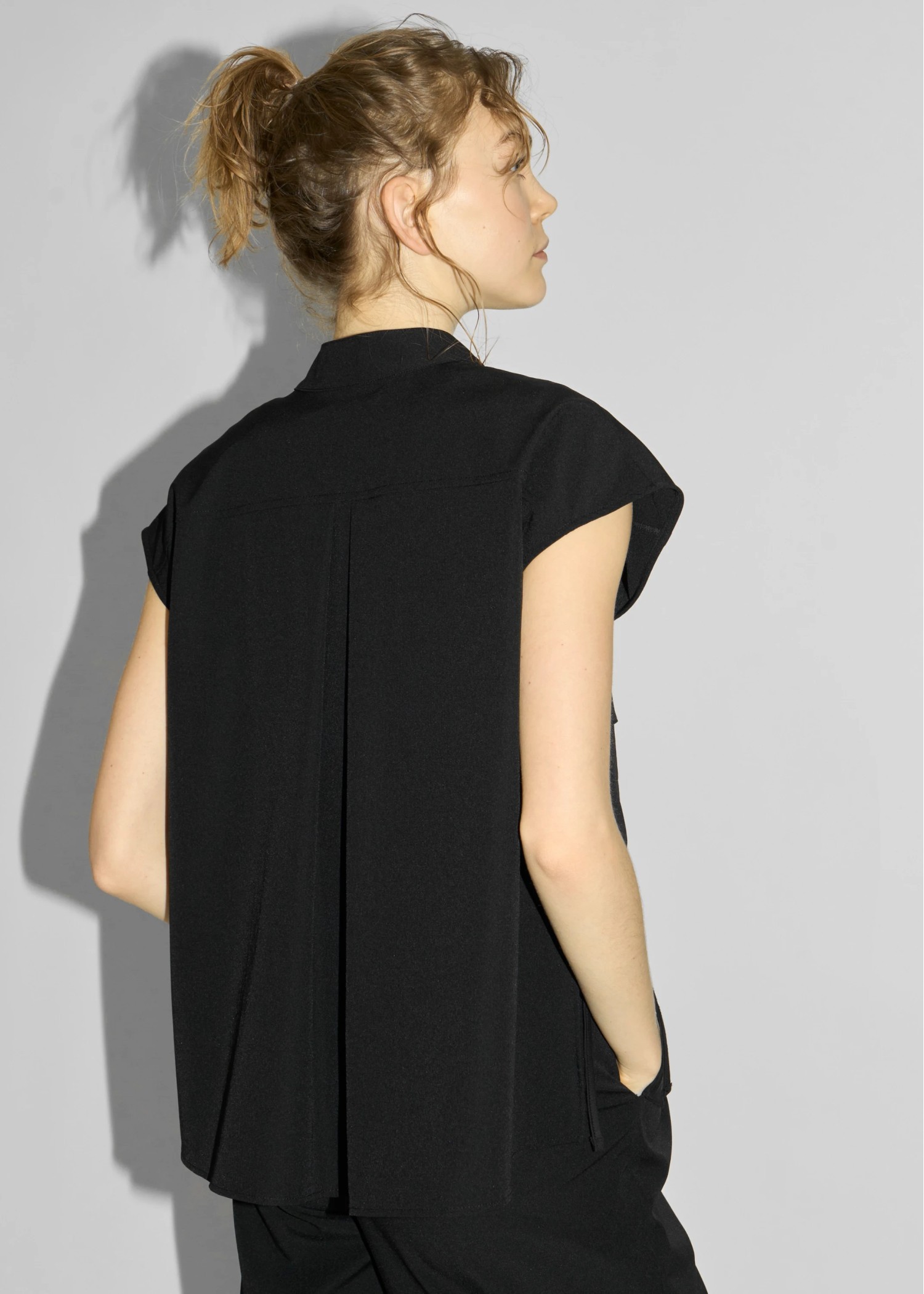 irregular hem flap pocket zip tops