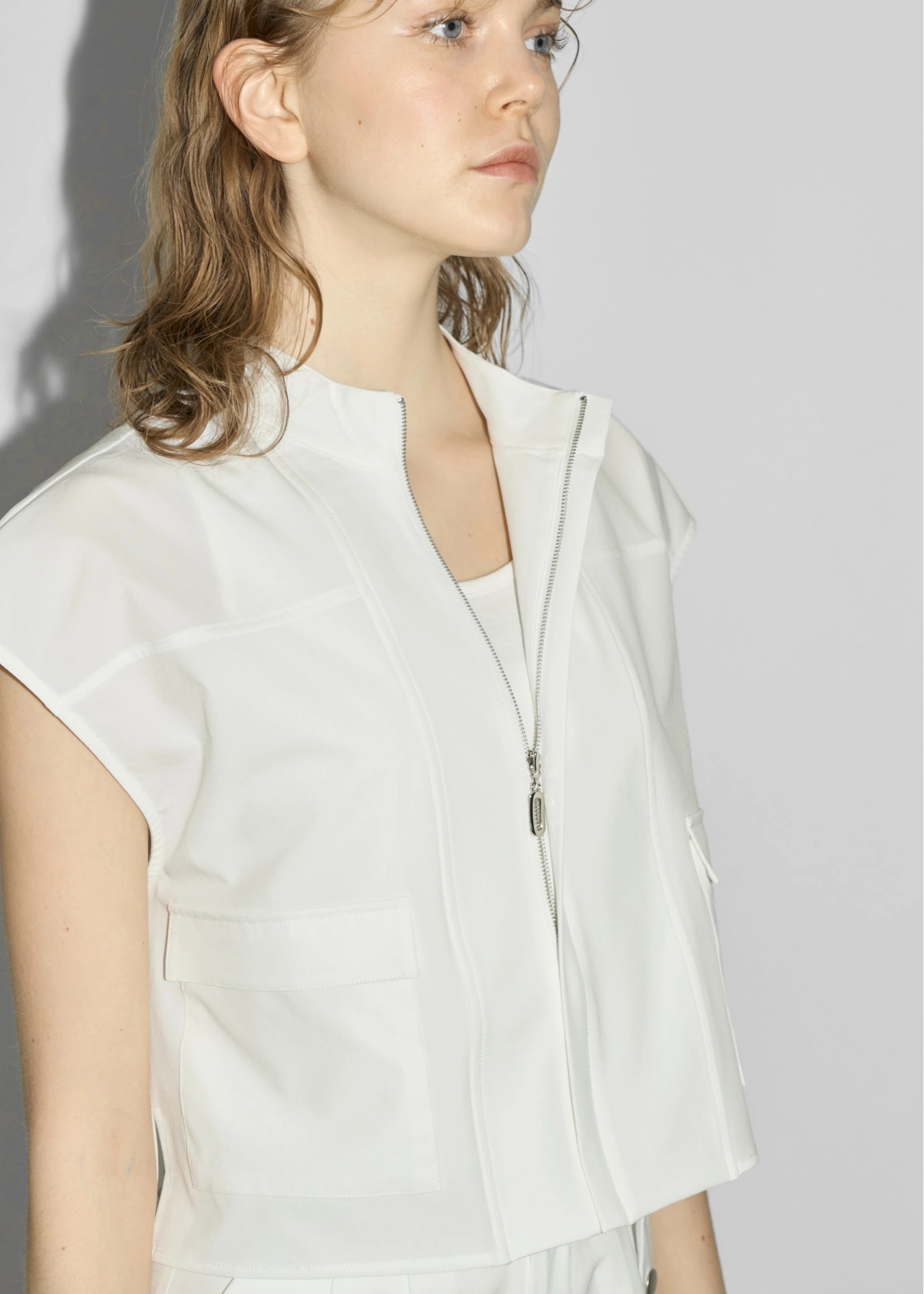 irregular hem flap pocket zip tops