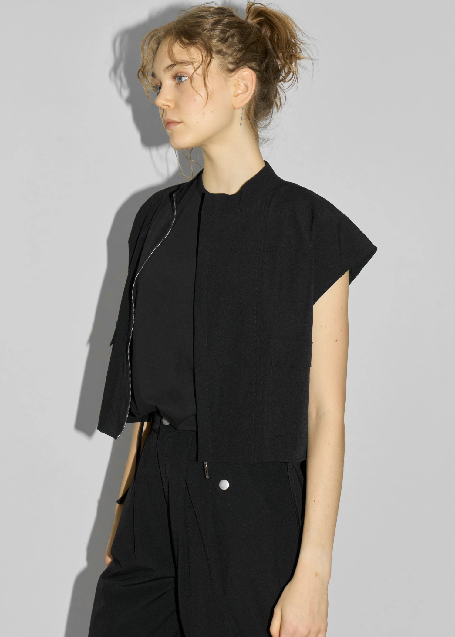 irregular hem flap pocket zip tops