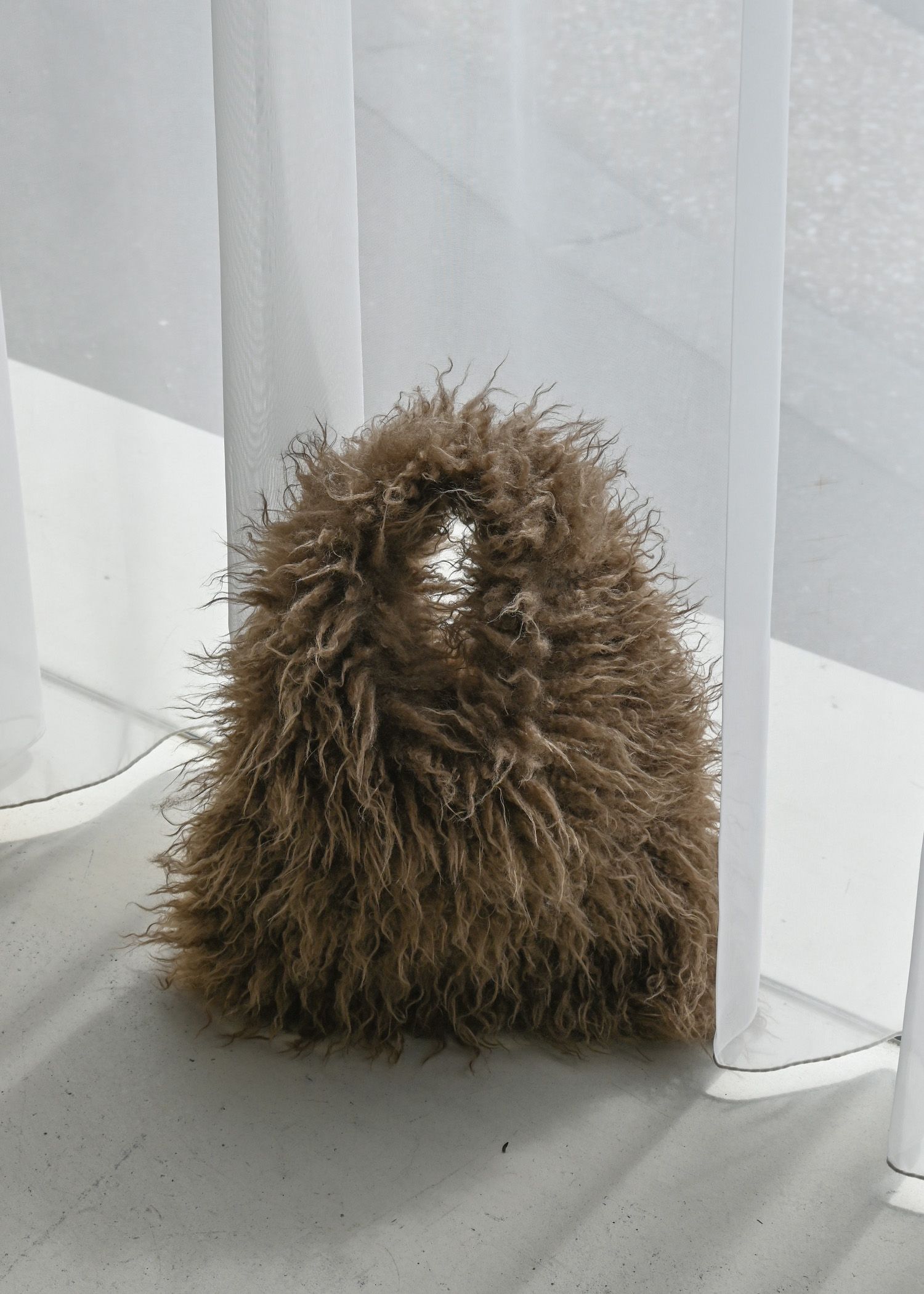 frizzy fur yeti bag