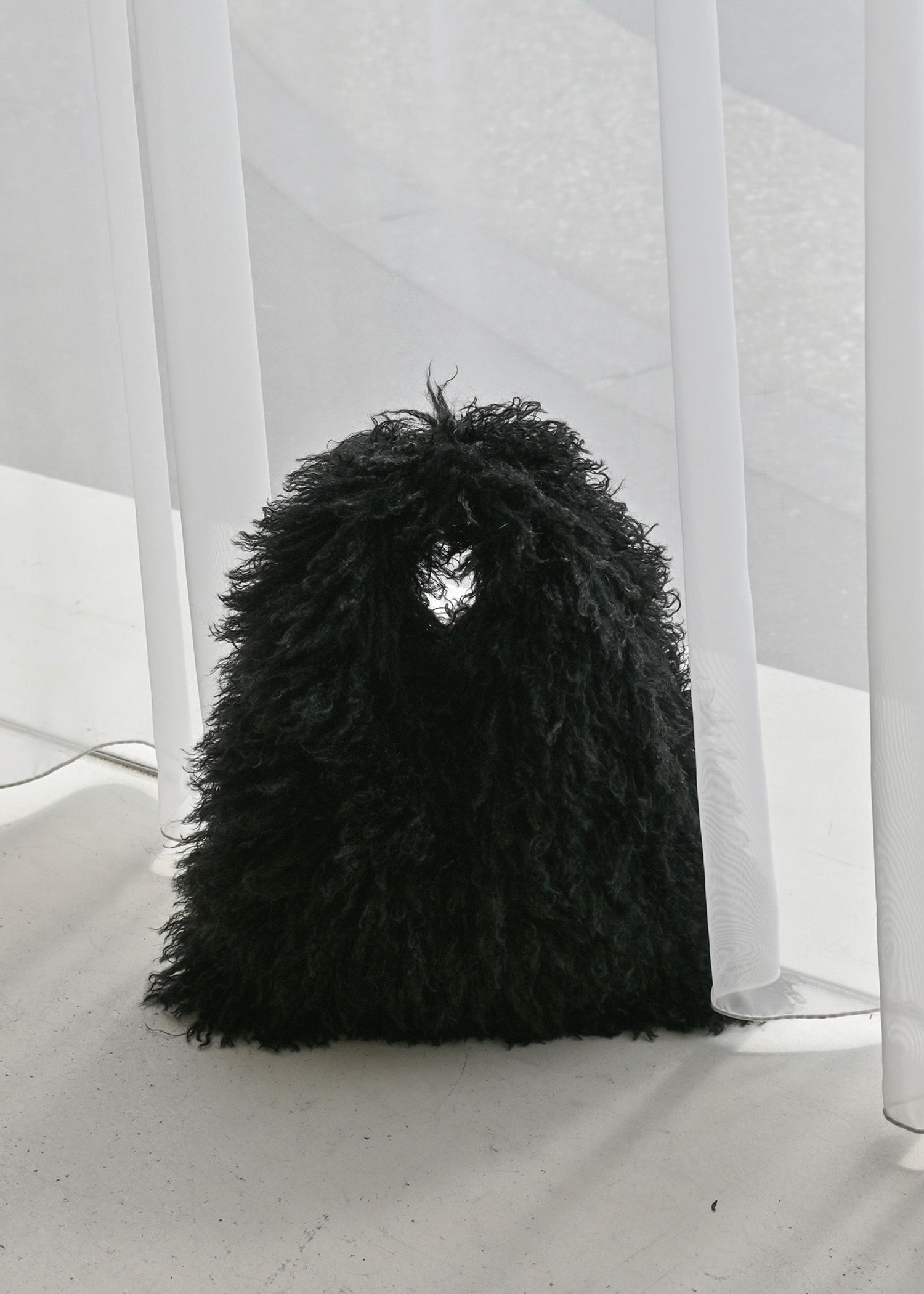 frizzy fur yeti bag