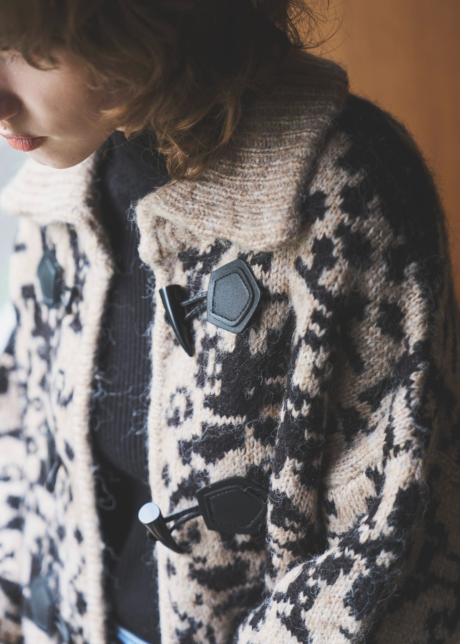 jacquard & cable placement  toggle knit