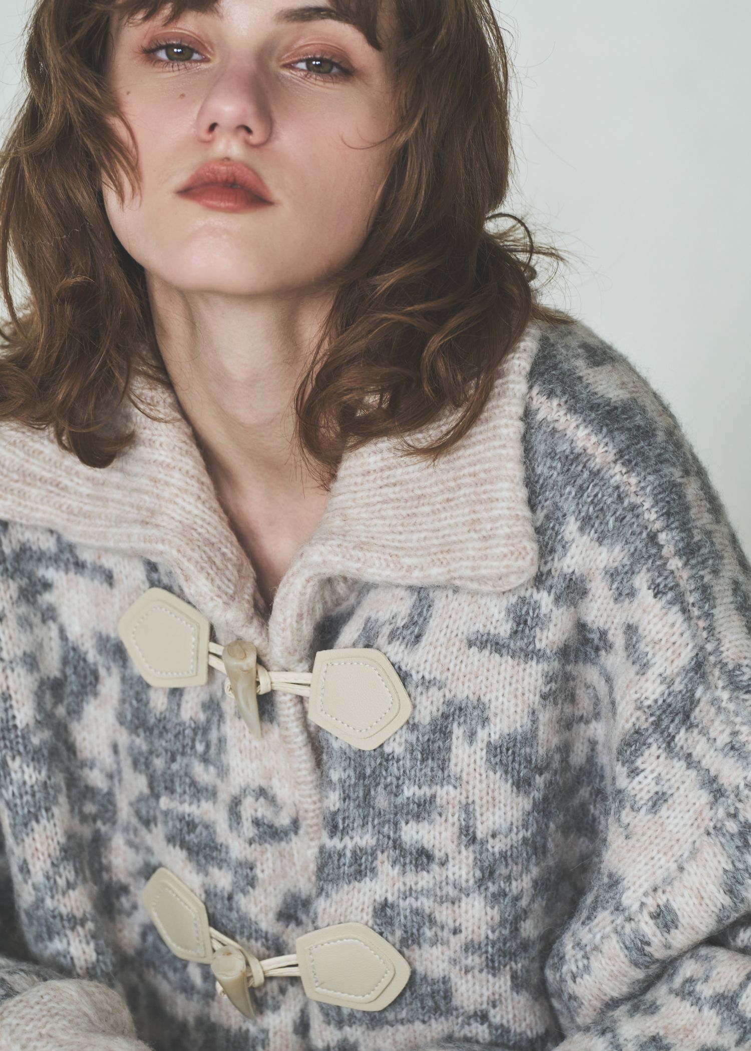 jacquard & cable placement  toggle knit