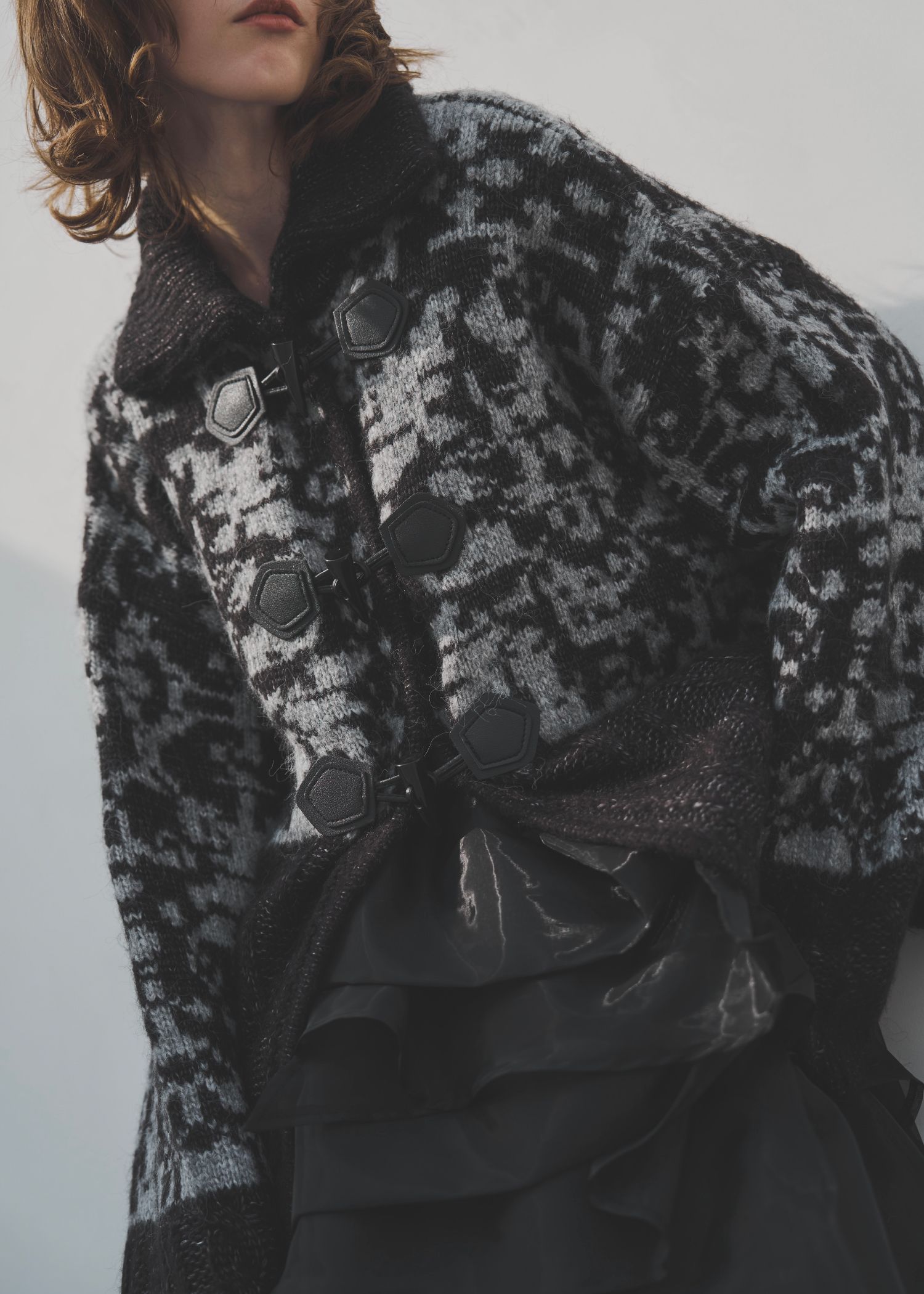 jacquard & cable placement  toggle knit