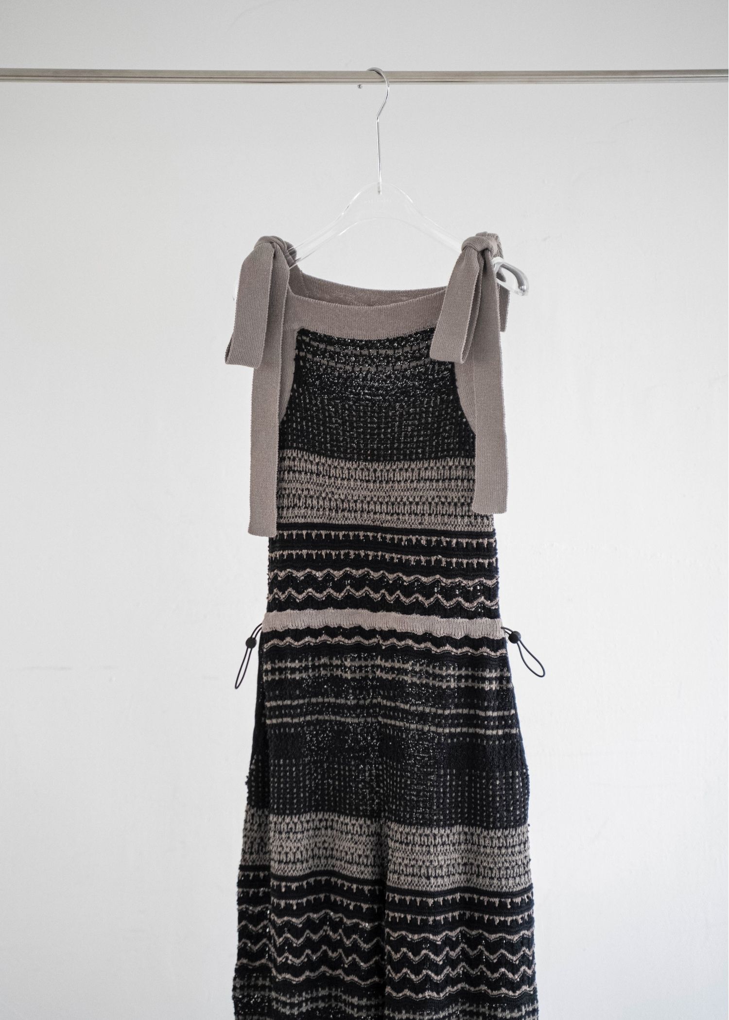 at random geometric pattern knit all-in-one