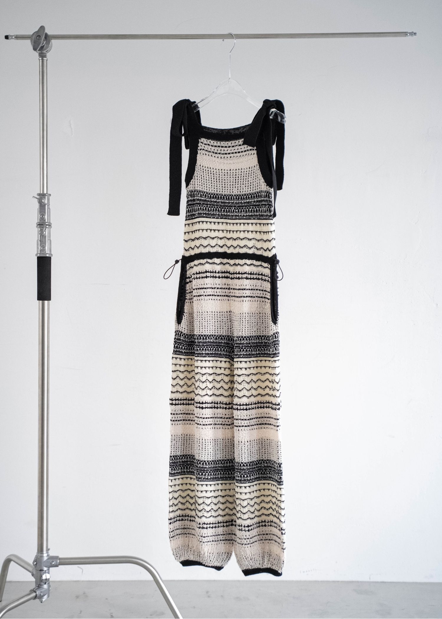 at random geometric pattern knit all-in-one