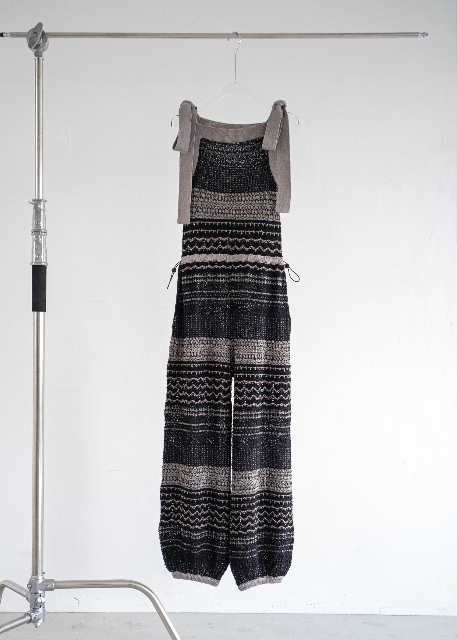 at random geometric pattern knit all-in-one