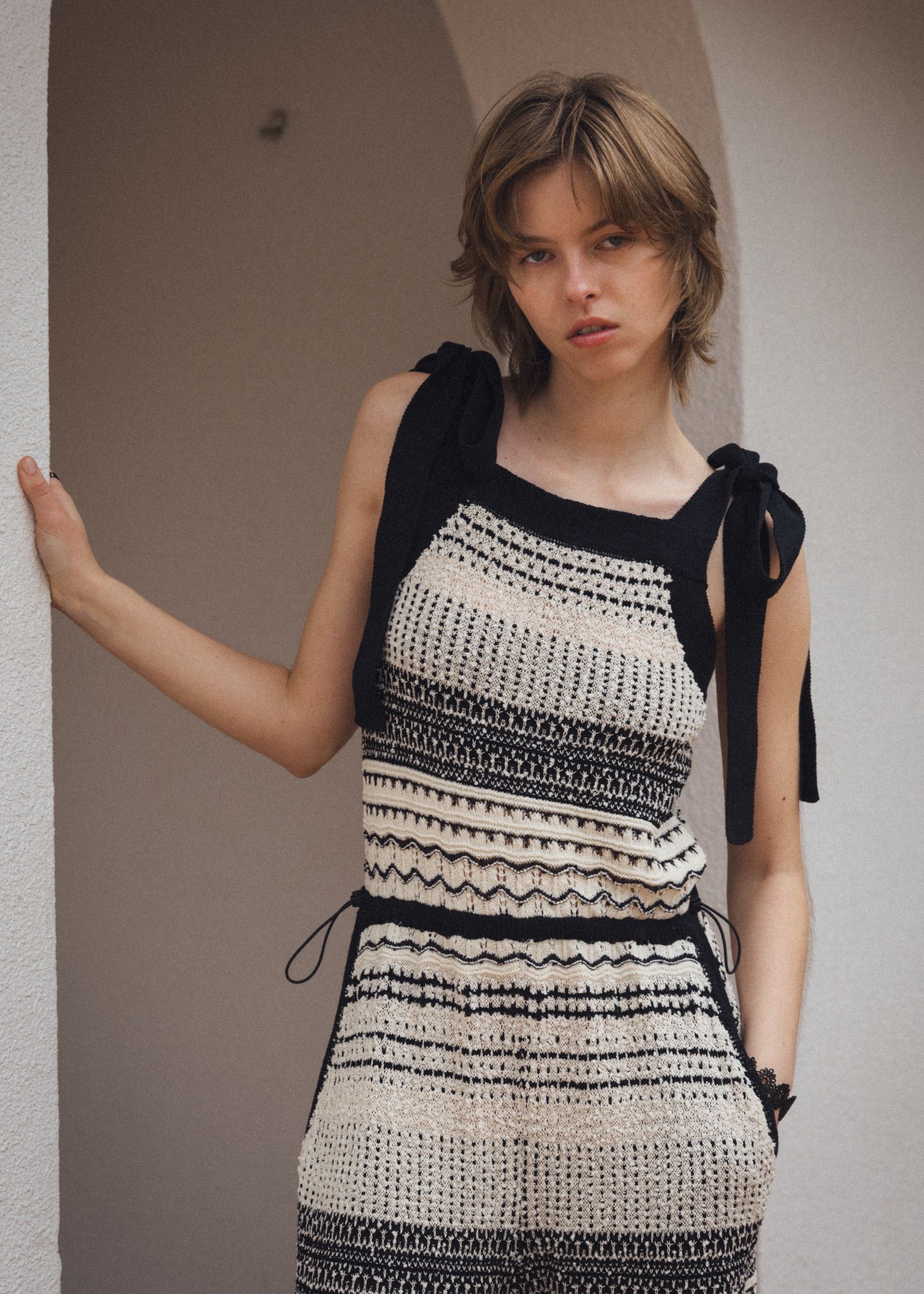 at random geometric pattern knit all-in-one